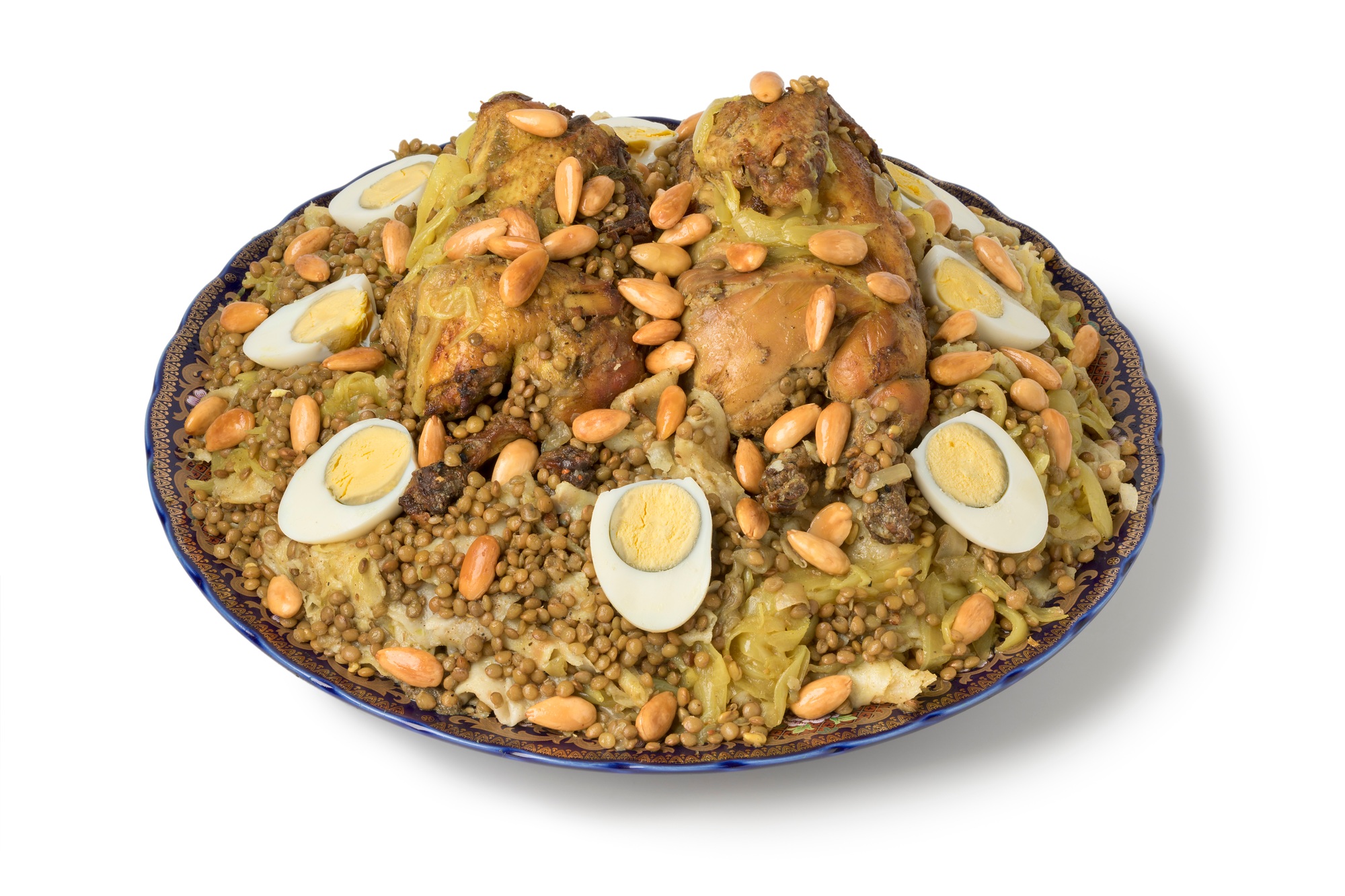 Traditional Moroccan Rfissa dish with eggs and almonds